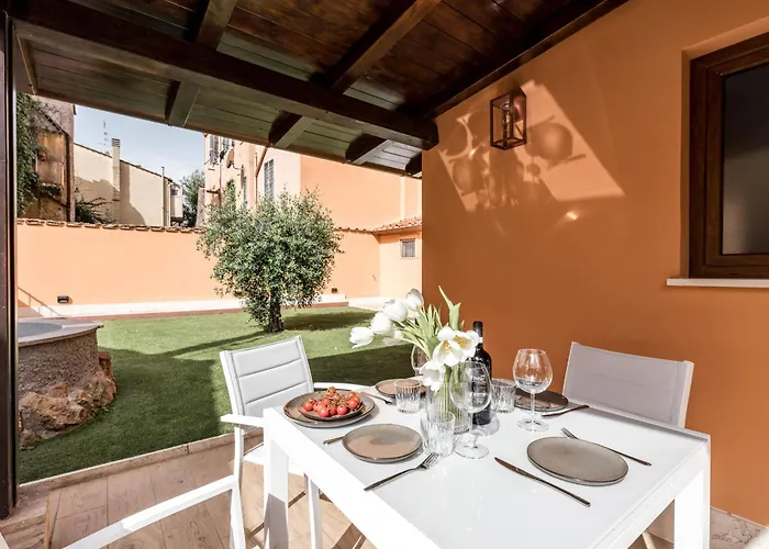 Апартаменты The Rent - Peaceful Oasis With Garden Near The Colosseum